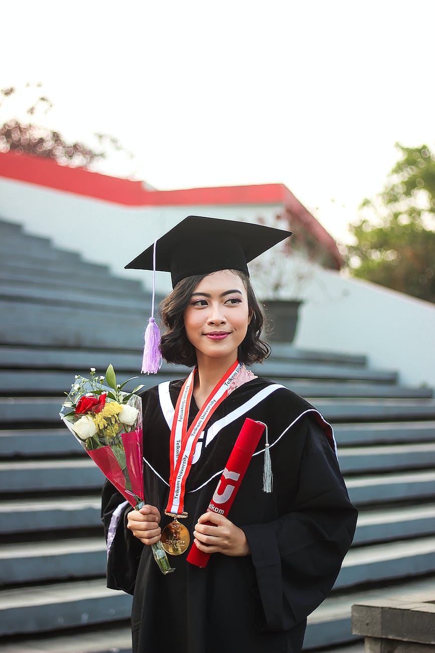 woman in academic dress and graduation hat